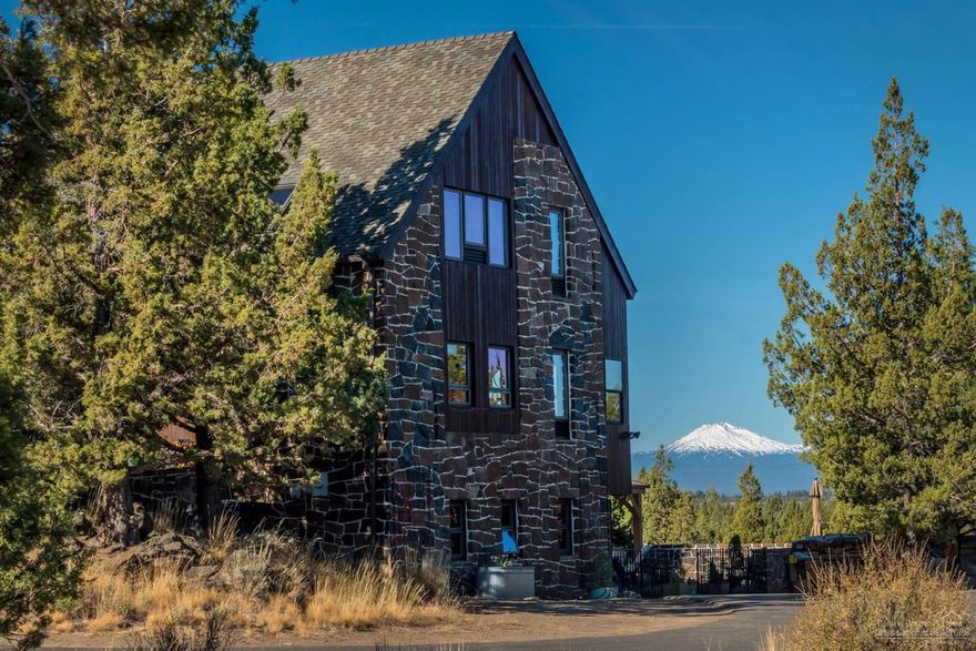 Fall in love with the craftsmanship of this timer framed Dutch Farmhouse situated on a 4.3 acre hilltop lot 5 miles east of town. Wake up to breathtaking views of the Cascades-from Hood to Bachelor-from practically every room. Enjoy cozy evenings w/a unique high efficiency fireplace. New kitchen w/quartz countertops, farm sink, subway tile & custom cabinets. Entertain friends & family in the large courtyard which features large concrete tile pavers, water feature & gazebo. One of a kind home.