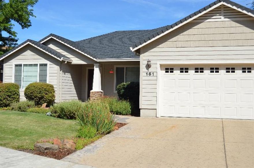 Pride of ownership shows throughout! Don't miss your chance to own this exceptional 3 bedroom, 2 bath home with a custom office. This home has an open, bright floor plan, with an inviting, well kept yard. This home boasts 9-10 foot ceilings throughout, a split floor plan, hardwood floors, and granite counter-tops. Wonderful neighborhood, part of the Eagle Point Golf Course community built by the high quality builder Bob Fellows. Several raised garden beds, recently stained fence, new water saving sprinkler heads, LED lighting throughout to save on power, recently pressure washed!