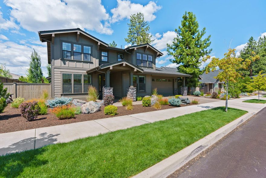 Positioned in the scenic community of River Vale in SW Bend, this home offers stunning mountain views and excellent opportunities for outdoor living. Enjoy direct access to the Deschutes River Trail, perfect for nature lovers and outdoor enthusiasts. The spacious 0.21-acre lot provides plenty of room for gardening, recreation, or simply relaxing on a sunny afternoon. The home features a large 4-car tandem garage, ideal for vehicles, hobbies, or even a home gym. Inside, the main level includes a dedicated office and a guest bedroom with a full en suite bath, offering both convenience and privacy. Upstairs, the primary bedroom showcases spectacular mountain views, creating a peaceful retreat. Two additional bedrooms and a versatile bonus room provide flexible living options.  Thoughtfully designed, this residence combines modern comfort and functionality with gorgeous natural surroundings, making it an ideal place to enjoy the Bend lifestyle.