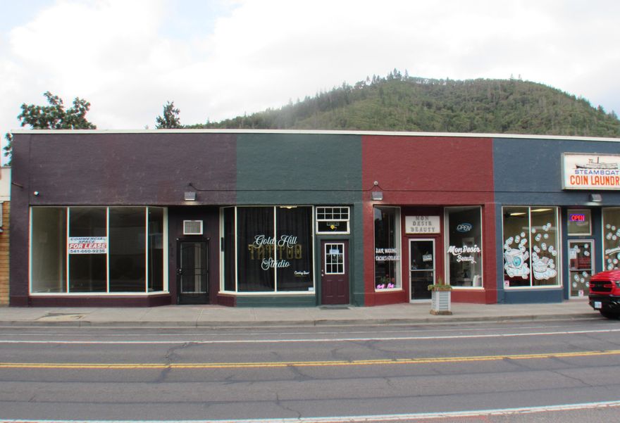 Prime, office/retail space now available in the heart of downtown Gold Hill. Located on Main street with high traffic and high visibility. Across from the public library and park. Mere blocks from the Rogue River. Offering open space, high ceiling and great natural light via large storefront windows. New paint and LVP flooring. Private bathroom. Owner reserves the right to approve tenant and use. Broker Owned.