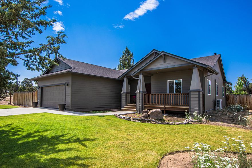 Great single story 1,552 sf, 3 bedroom, 2 bath home located on a private 10.4 acre parcel.  Updates in the past 2 years:  Tear off composition roof, asphalt driveway, ductless A/C unit, dishwasher, New Zealand wool carpet, extra attic insulation, well pressure tank.  According to the seller, property could be subdivided into (2) 5 acre parcels.  Backs up to BLM land.  Hay barn and utility shed.  Solid frame alder cabinets throughout.  Kitchen with separate dining area overlooking the backyard.  Living room with wood stove.  Master bath with dual vanities, tub/shower.  Guest bath with single vanity, tub/shower.  Laundry room with overhead cabinets.  Oversized 2 car attached garage with high ceiling.  Covered front porch.  Back paver patio.  Beautiful landscaping front and back with lawn.  Fully fenced property with gate at entrance.  6 ft. privacy fence around home and backyard.  Room to build a detached barn, garage or shop. Horse or livestock property.  Low annual HOA fee.