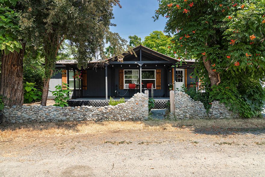 Welcome to Home Sweet Home! This cute & cozy 3 bed, 2 bath home with a split floor plan sits on roughly 3/4 of an acre with a seasonal creek, and many fruit trees: apple, peach, plum, and pie cherry. Sit and relax on the very inviting, large covered front porch and take in that sweet Southern Oregon air. The feel of country and yet only 10 minutes to town. Need extra storage space? There is a single-car garage. Schedule your appointment today!