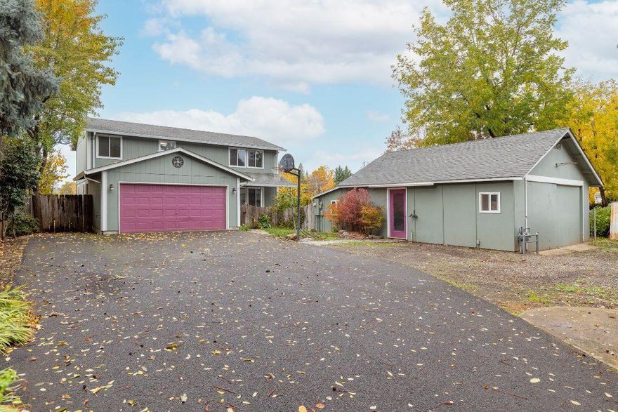 Come fall in love with this spacious traditional home! With 4 bedrooms, 2.5 baths, and a large bonus room, this house has room for the whole family. Need a separated space for an at home office, work out room, or shop? This home has it, with a detached insulated space that can be heated and cooled. Sitting on 0.23 acres, enjoy various fruit trees, the mountain views, and all that this fenced property has to offer. Don't wait on this one!