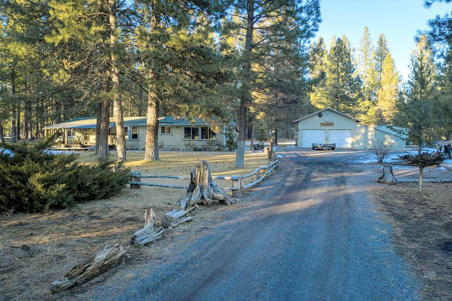 Bring your hobbies & love of gardening this private 20 Acre property! Main house has 3 bed & 2 bath w/ bonus room that could be 4th bedroom. Kitchen fully remodeled in 2020 & Bathrooms in 2018. New Heat Pump w/AC (2020), Wood Stove (2018), Roof (2017) & Windows (2013). Main shop is 20x20 w/ 2 garage doors & a 15X20 finished bonus room on the back that could be a guest room, craft room or office. Second shop is 20x30 w/ 220V power. Need extra storage space? There are 2 storage buildings (10x15 &10x20) & a detached 10x15 pantry.  Like animals? There is a chicken coup & a full pig pen with shelter. Could make a wonderful horse property. Large fenced garden & thermodynamic green house. Needing a separate living space? The front of the property has a separate electric meter & septic tank for RV or possible 2nd home (buyer due diligence). See more great amenities on the 3D tour at https://mls.ricohtours.com/5e41a32a-1c4b-4c25-9207-78d8c21086e3 then book a tour today!