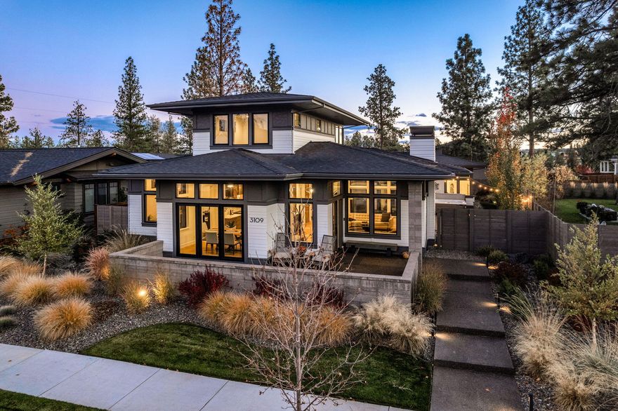 Modern prairie home in highly sought-after Discovery West, this turn key residence was built for a Custom Home Builder. Lives like a single level with 3 ensuites and an office/bedroom. Open and airy accentuated with 10 ft ceilings and abundant natural light from large windows. The gourmet kitchen is a chef's dream, GE Monogram appliances, a butler pantry, wine fridge, large island, coffee station and custom built-ins. Rich walnut wood doors and hardwood floors create seamless flow, enhanced by motorized window coverings and custom lighting. The primary suite is a spa-like retreat with a soaking tub, heated floors, and an upgraded closet system. Private south facing courtyard, perfect for entertaining, a large seating area and a cozy fire pit. Extra deep garage at nearly 1000 sq ft with oversized RV/Sprinter 3rd bay, EV charger, built in cabinets and epoxy floors. Located near NWX amenities, restaurants, trails, and the Deschutes National Forest. This truly is the Best of Bend living.