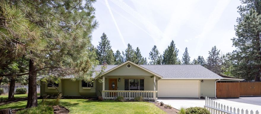 This wonderful home sits on a little over ½ an acre tucked away on a quiet cul-de-sac and nestled in the pines in sought-after SW Bend.  This 3 bed, 2 bath home offers 1,999 sq ft of comfortable living space with a huge bonus room—ideal for a playroom, home office, or guest area. Built in 1994, the property sits on a beautifully landscaped and fully fenced lot with mature trees, paved RV parking, a double RV cover and other covered parking. The oversized attached 2-car garage includes a generous shop area perfect for hobbies or storage. A standout feature is the detached 480 sq ft bonus building with full utilities—ready to be a studio, guest quarters, or additional workspace. A rare find with both space and flexibility in one of Bend's most desirable neighborhoods!  Seller is offering a $10k flooring allowance.