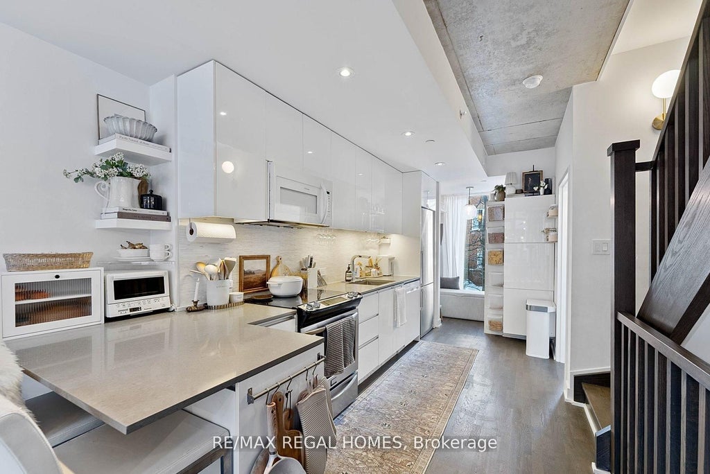 Photo of 1238 Dundas Street E #TH110, Toronto, ON M4M 0C6 (MLS # E13493952)