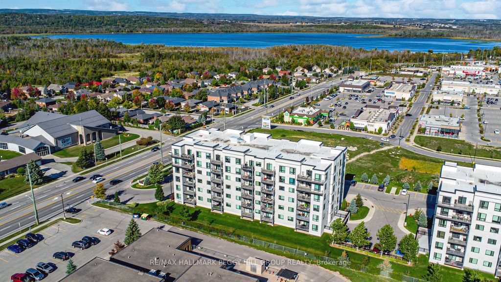 Photo of 295 Cundles Road E #404, Barrie, ON L4M 0K8 (MLS # S13054188)