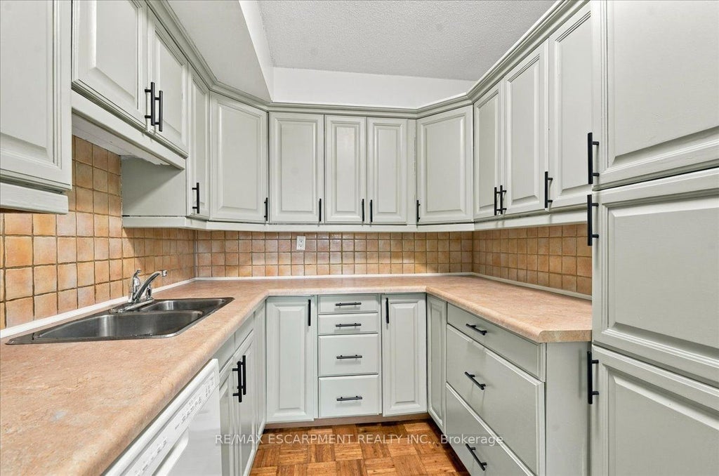 Photo of 1300 Marlborough Court #322, Oakville, ON L6H 2S2 (MLS # W14034532)