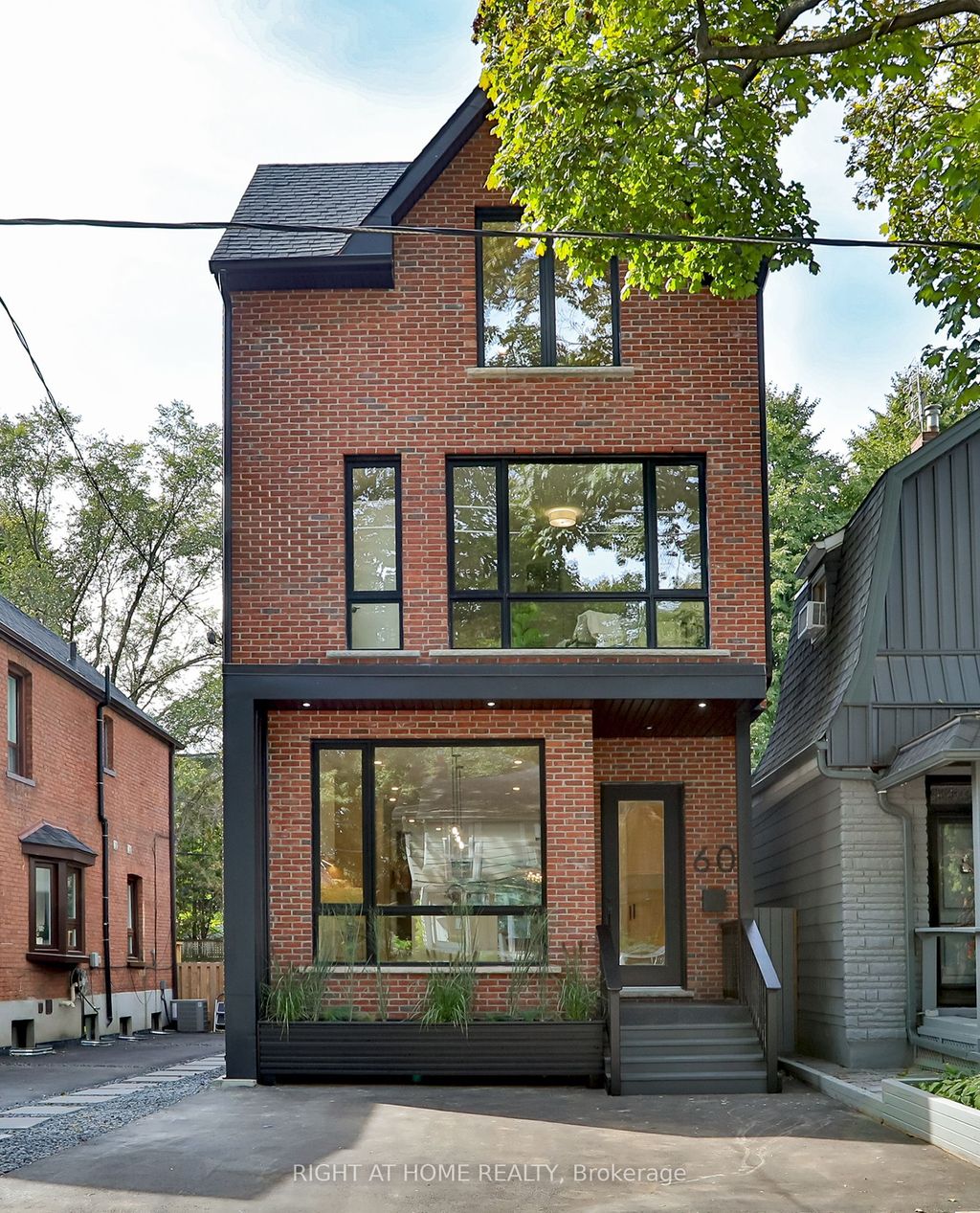 Photo of 60 Winnifred Avenue, Toronto, ON M4M 2X3 (MLS # E12446485)