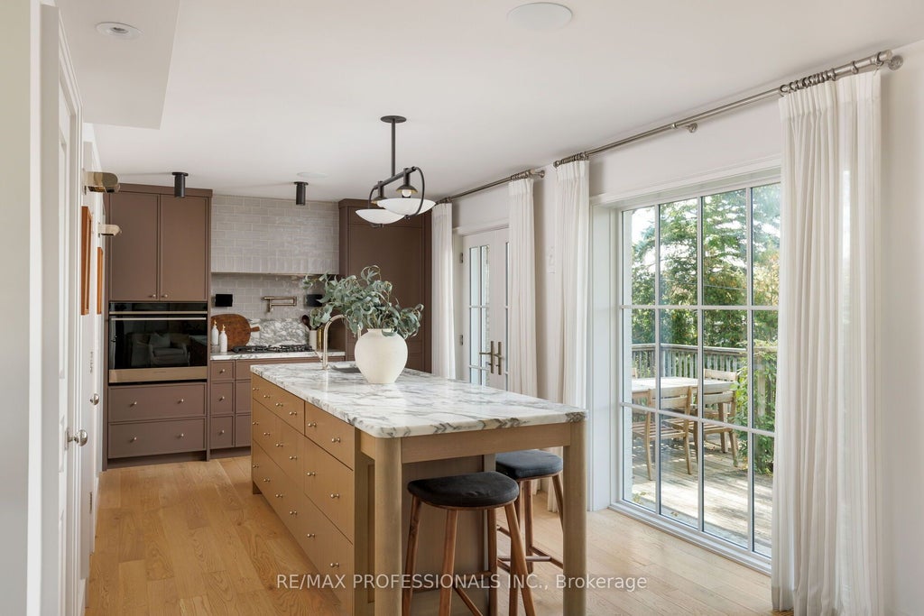 Photo of 8 Glenn Murray Drive, Toronto, ON M8Y 3H3 (MLS # W13885886)