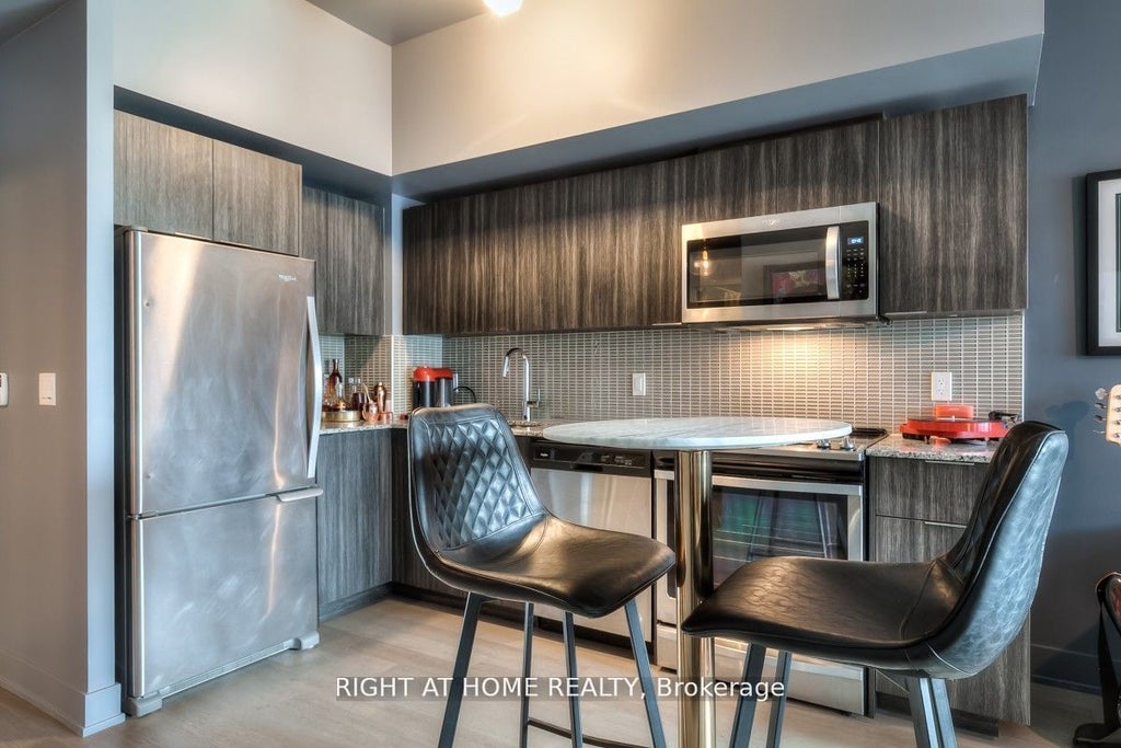 Photo of 30 Shore Breeze Drive #540, Toronto, ON M8V 1A1 (MLS # W13841754)