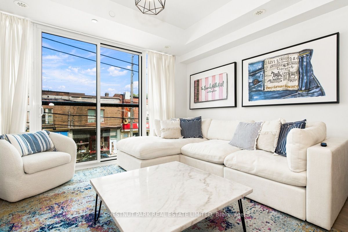 899 Queen Street E 205