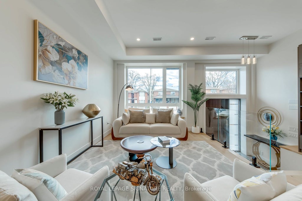 Photo of 850 Cosburn Avenue, Toronto, ON M4C 2W2 (MLS # E13438554)