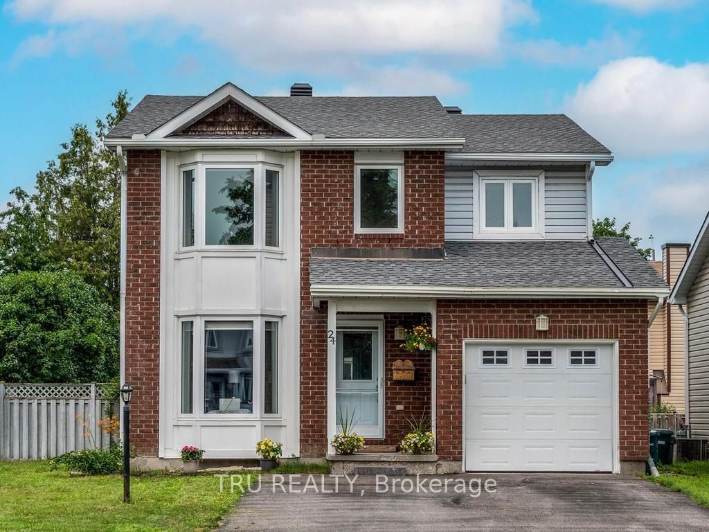 Welcome to 24 Soho Cres. Room to park 4 cars!