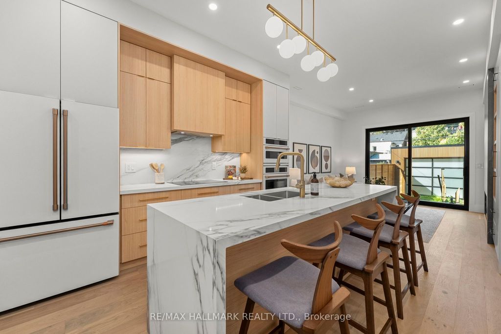 Photo of 46A Pape Avenue, Toronto, ON M4M 2V6 (MLS # E12407305)