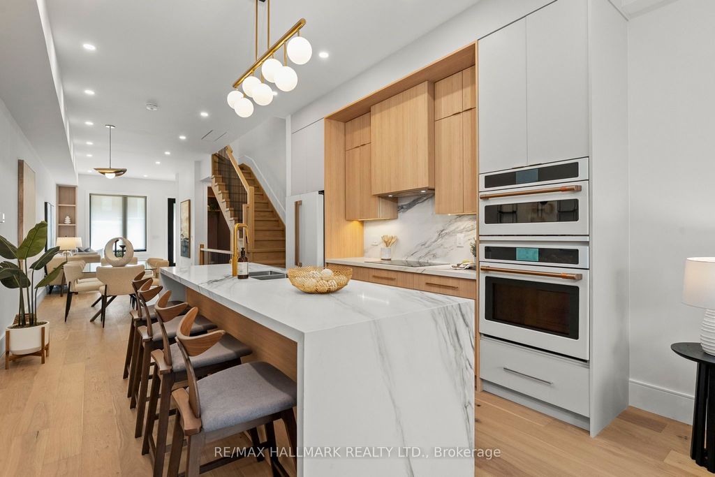 Photo of 46A Pape Avenue, Toronto, ON M4M 2V6 (MLS # E12407305)