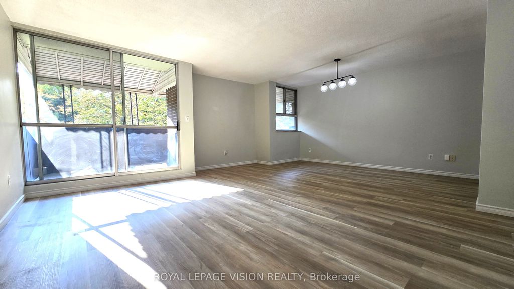 Photo of 6 Crescent Town Road #406, Toronto, ON M4C 5L3 (MLS # E12397339)