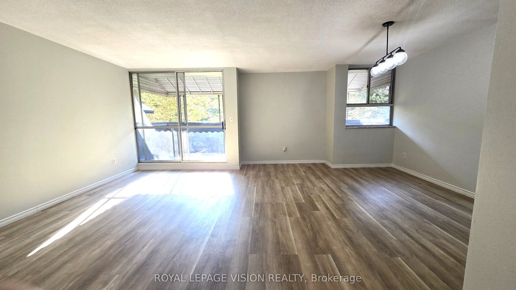 Photo of 6 Crescent Town Road #406, Toronto, ON M4C 5L3 (MLS # E12397339)