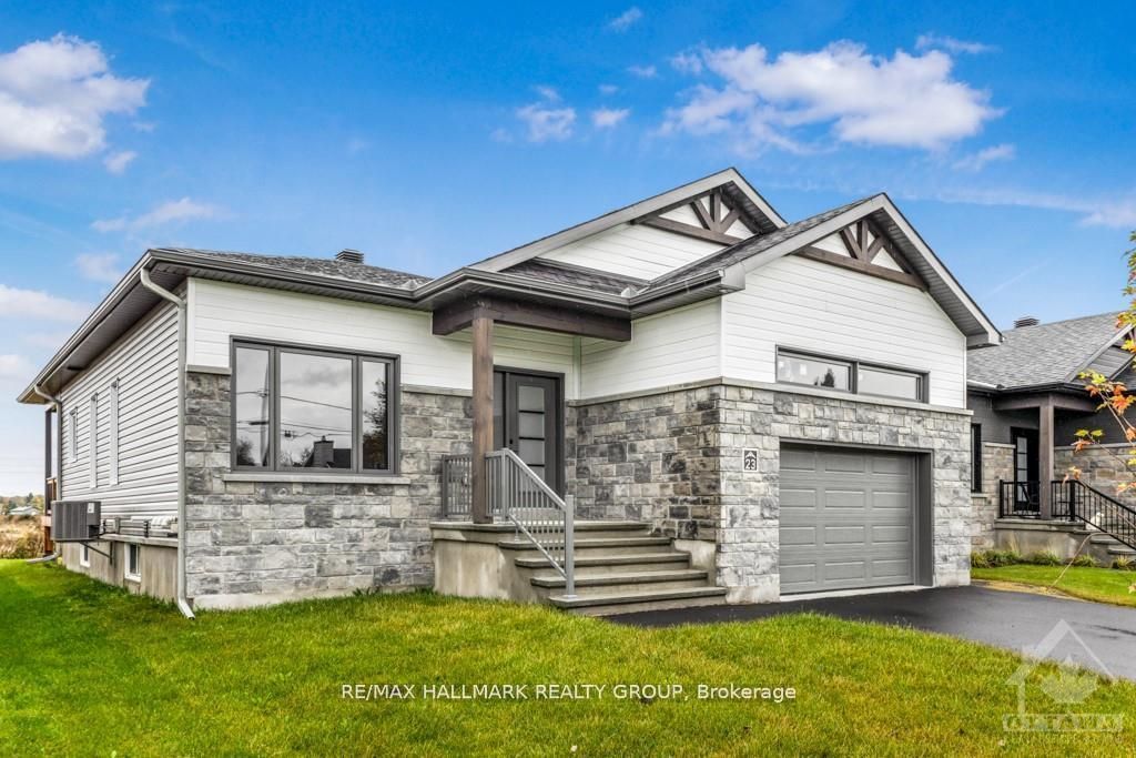 Photo of 313 ZAKARI Street, Casselman, ON K0A 1M0 (MLS # X13044604)