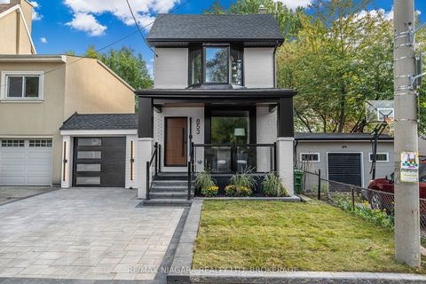 Photo of 853 Sammon Avenue, Toronto, ON M4C 2E9 (MLS # E12568972)