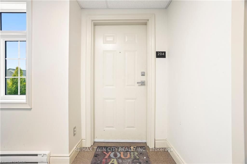 Photo of 64 Frederick Drive #204, Guelph, ON N1L 0P3 (MLS # X14096254)