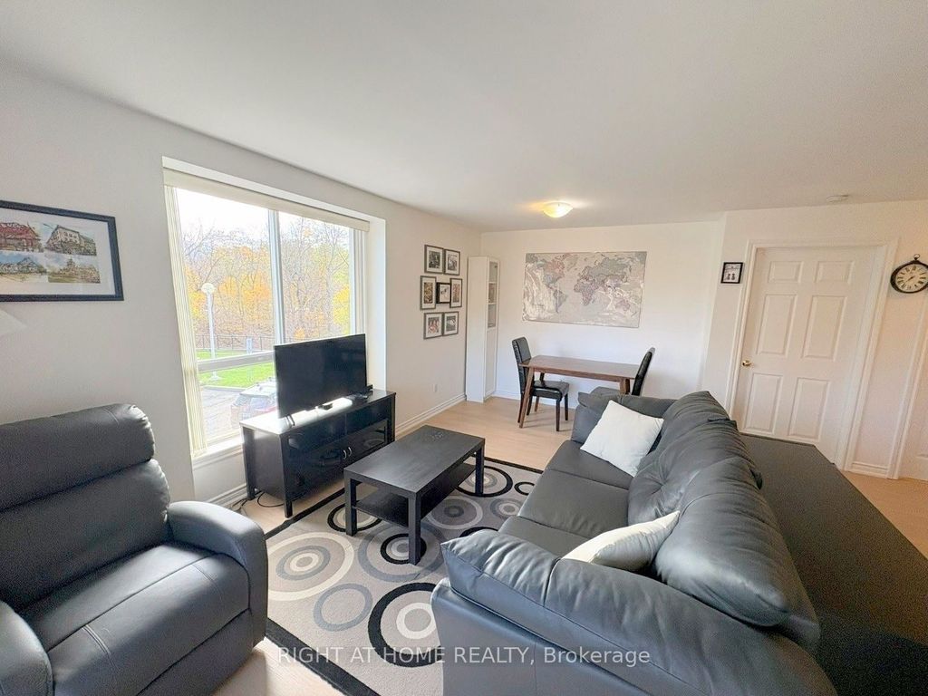 Photo of 2000 Creekside Drive #202, Hamilton, ON L9H 7S7 (MLS # X13094116)