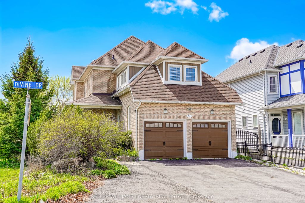 Photo of 51 Divine Drive, Whitby, ON L1R 2T5 (MLS # E13100494)