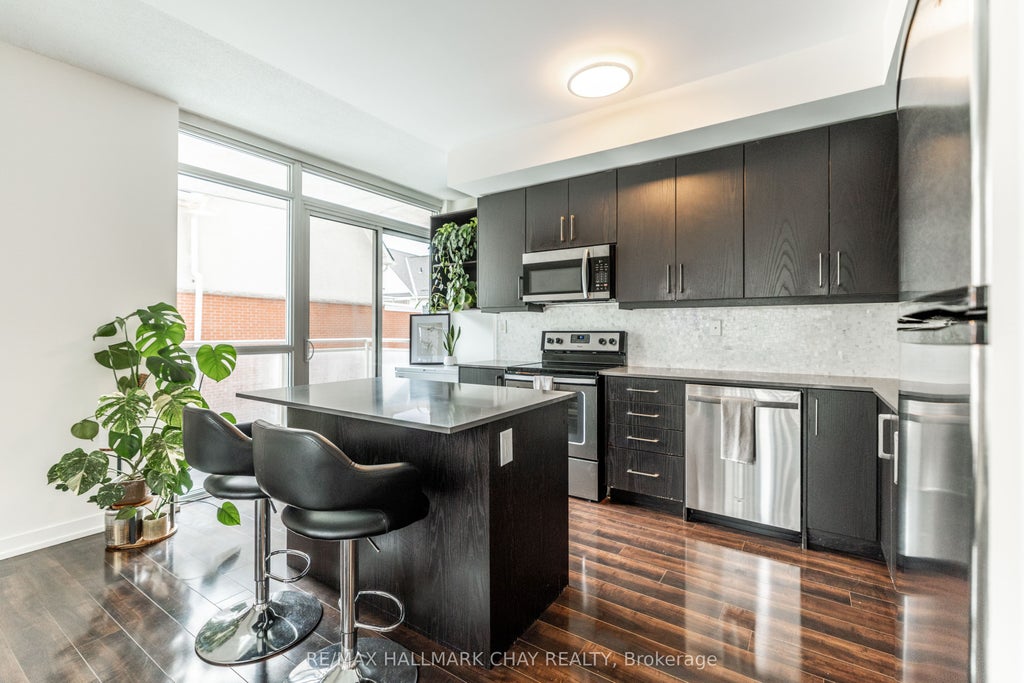 Photo of 5101 Dundas Street W #204, Toronto, ON M9A 1C3 (MLS # W13857032)