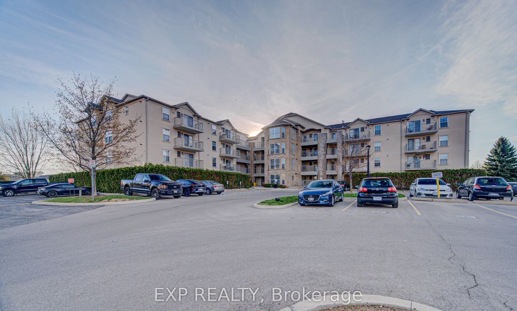 Photo of 1490 Bishops Gate #106, Oakville, ON L6M 4N3 (MLS # W13055916)