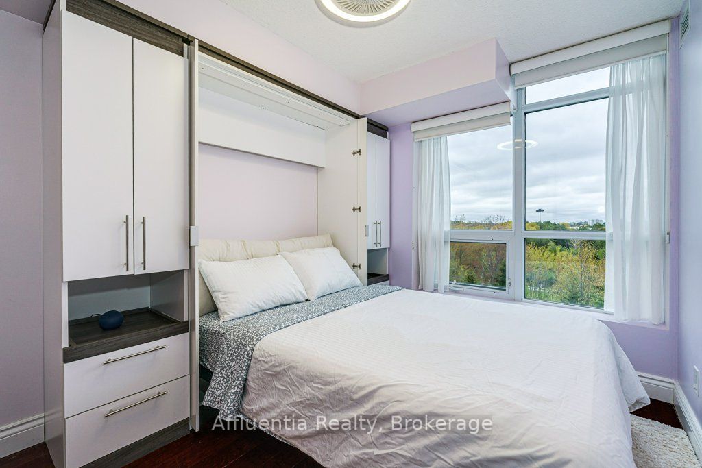 Photo of 120 Dallimore Circle #408, Toronto, ON M3C 4J1 (MLS # C13140826)
