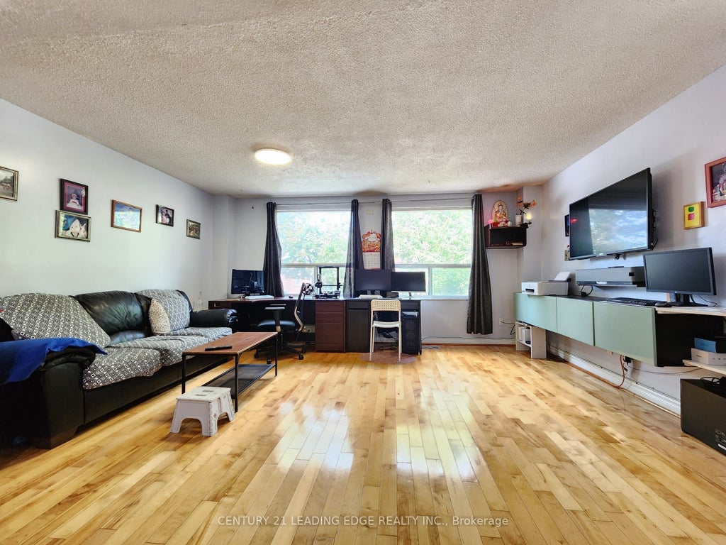 Photo of 203 Lotherton Pathway #82, Toronto, ON M6B 2G6 (MLS # W13750718)