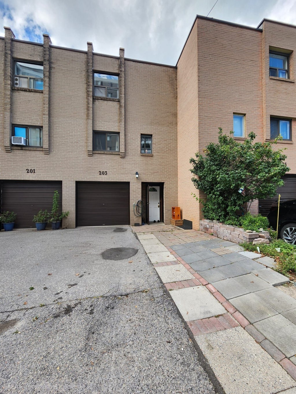 Photo of 203 Lotherton Pathway #82, Toronto, ON M6B 2G6 (MLS # W13750718)