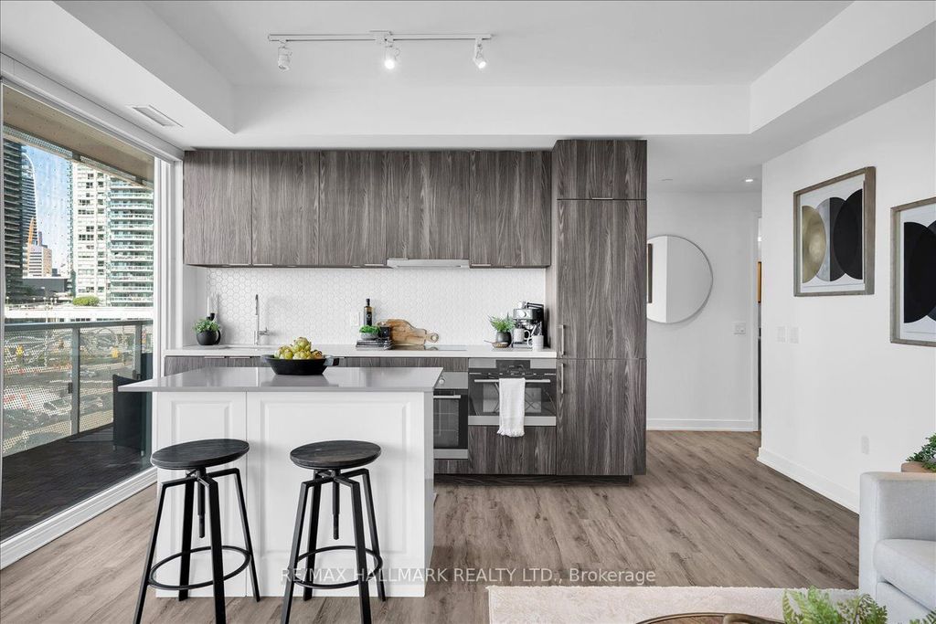 Photo of 15 Queens Quay E #311, Toronto, ON M5E 0A4 (MLS # C12462361)