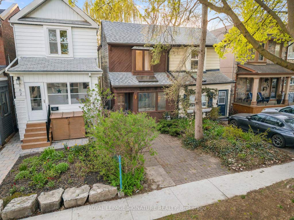 Photo of 164 Rhodes Avenue, Toronto, ON M4L 3A1 (MLS # E13596636)