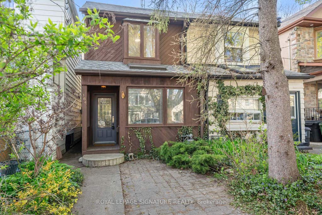 Photo of 164 Rhodes Avenue, Toronto, ON M4L 3A1 (MLS # E13596636)