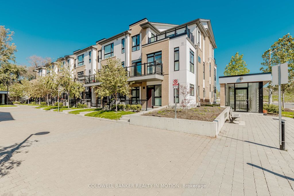 Photo of 90 Canon Jackson Drive #TH203, Toronto, ON M6M 0C1 (MLS # W12447269)