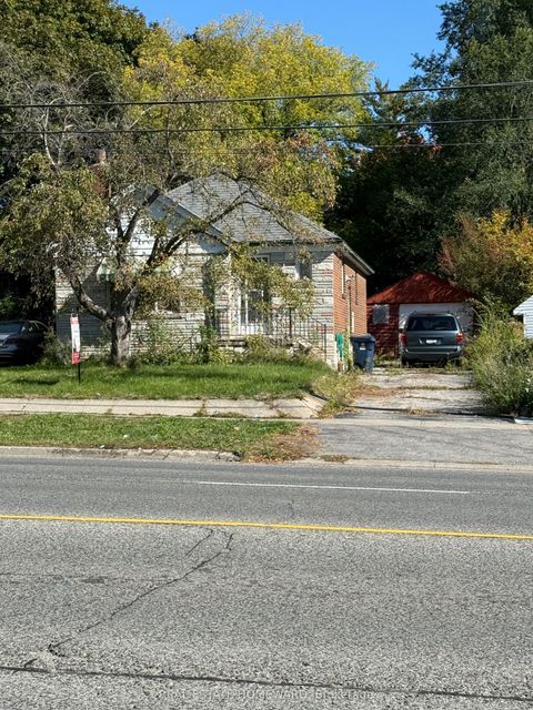 Photo of 1411 Victoria Park Avenue, Toronto, ON M4A 2L9 (MLS # E12461638)