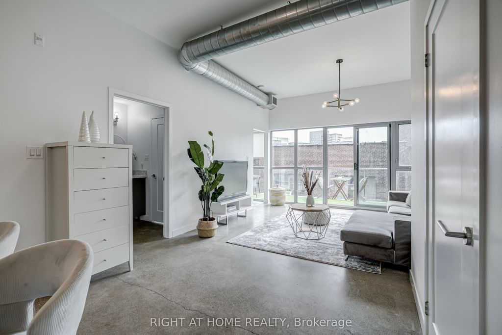 Photo of 569 King Street E #409, Toronto, ON M5A 1M5 (MLS # C12476165)