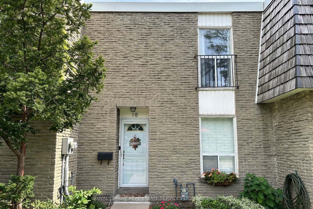 Photo of 71 Old Burnhamthorpe Road #18, Toronto, ON M9C 3J6 (MLS # W13876852)
