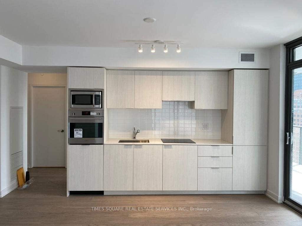 Photo of 11 Wellesley Street W #1008, Toronto, ON M4Y 0G4 (MLS # C13611206)