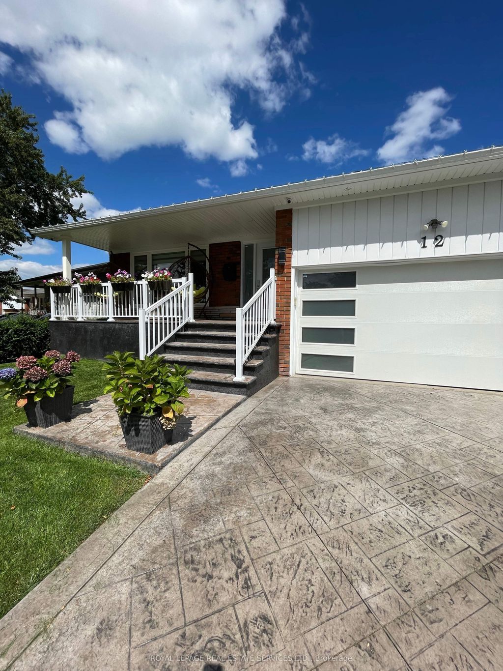 Photo of 12 Warlingham Court, Toronto, ON M9C 3K3 (MLS # W12550160)