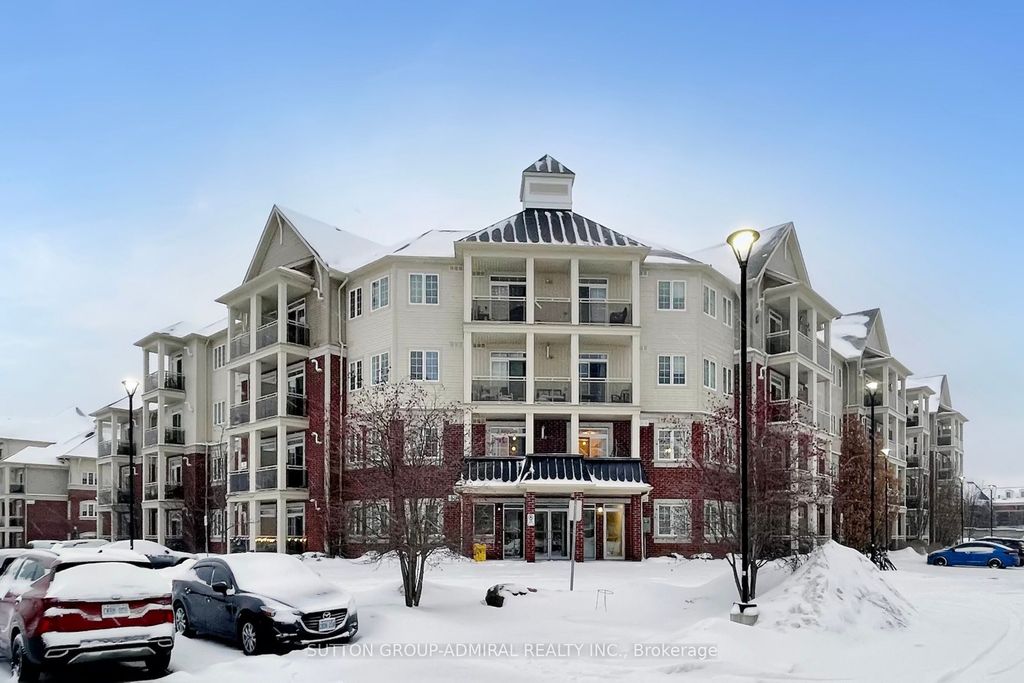Photo of 80 Aspen Springs Drive #423, Clarington, ON L1C 0V4 (MLS # E12730042)