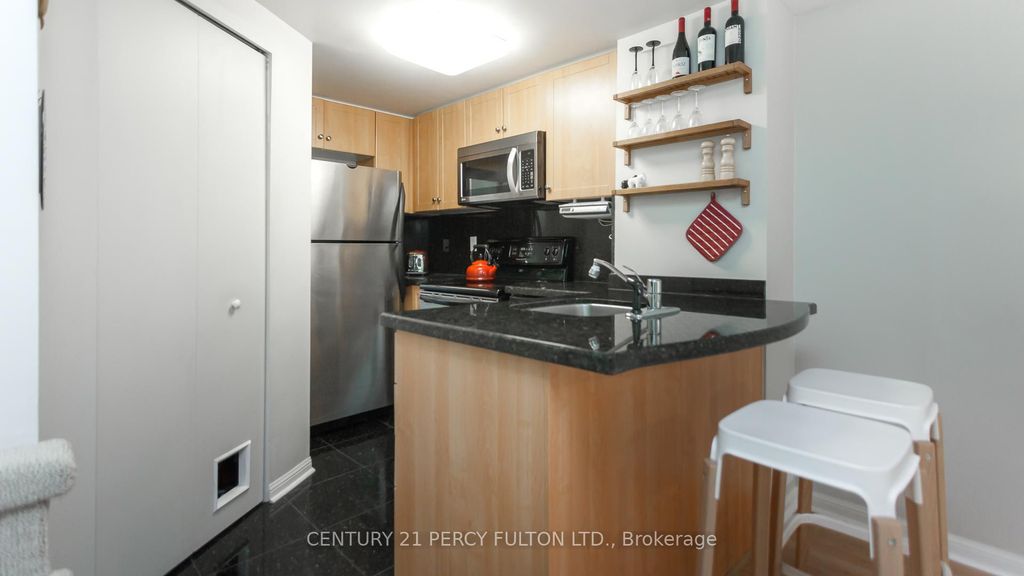 Photo of 20 Machells Avenue N #112, Toronto, ON M6K 3H8 (MLS # W13010212)