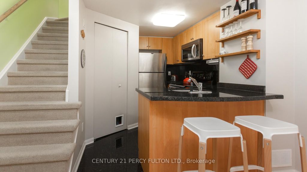 Photo of 20 Machells Avenue N #112, Toronto, ON M6K 3H8 (MLS # W13010212)