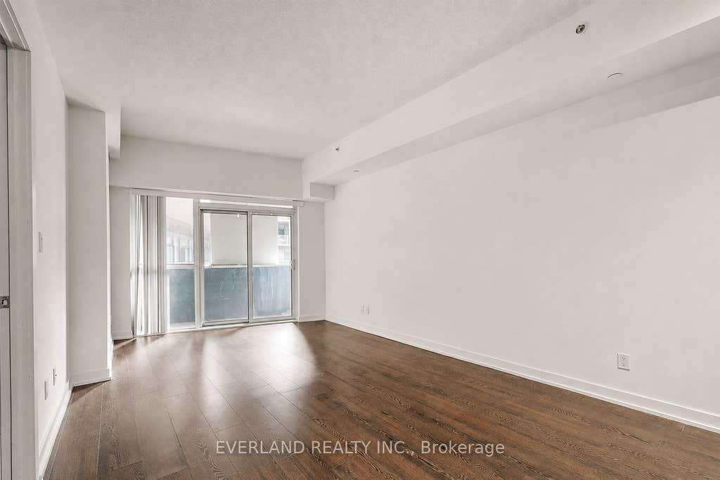 Photo of 20 Bruyeres Mews #201, Toronto, ON M5V 0G8 (MLS # C13653562)