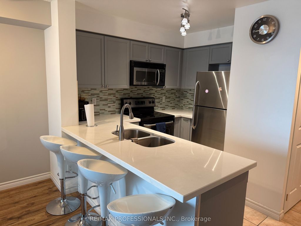 Photo of 7 Michael Power Place #1406, Toronto, ON M9A 0A4 (MLS # W13010412)