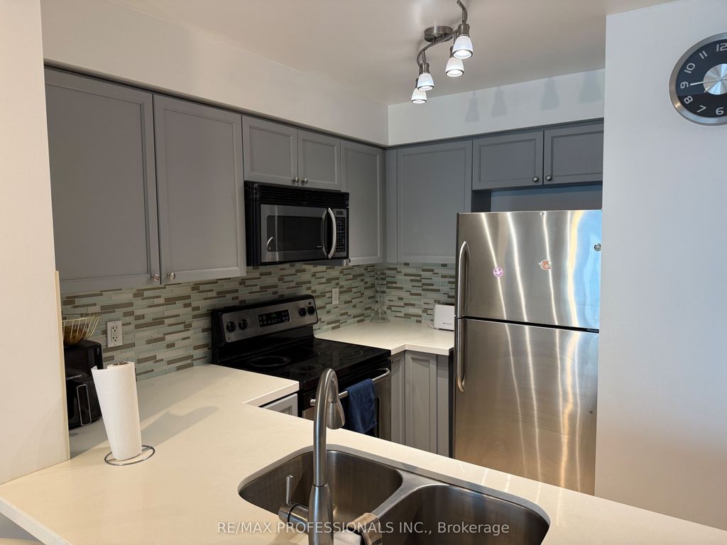 Photo of 7 Michael Power Place #1406, Toronto, ON M9A 0A4 (MLS # W13010412)