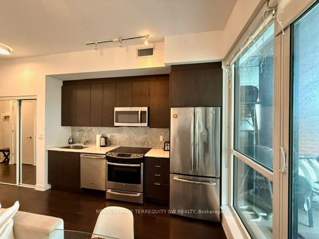 Photo of 50 Bruyeres Mews #208, Toronto, ON M5V 0H8 (MLS # C12482183)