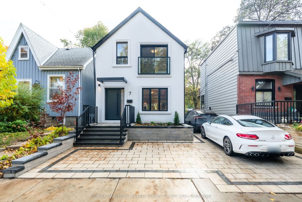 Photo of 7 Ivy Avenue, Toronto, ON M4L 2H6 (MLS # E12575204)